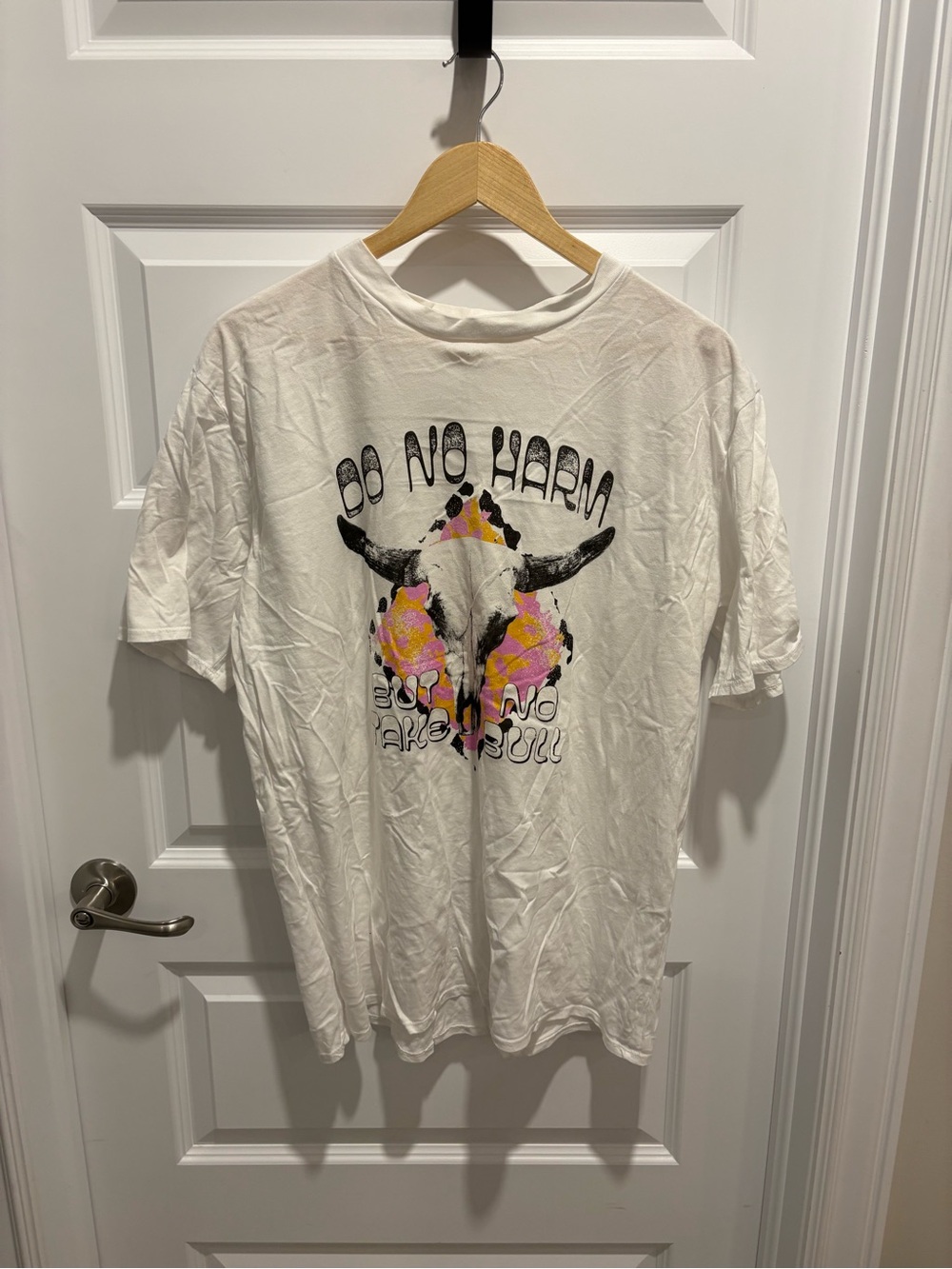 White Graphic Tee with Bull Skull and Pink/Yellow Floral Accent
